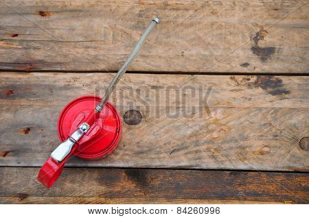 Oil can on wooden background, Lube oil can and used in industry or hard works.