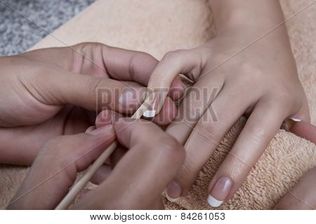 Manicure. Cuticles removal.