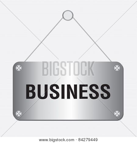 silver metallic business sign