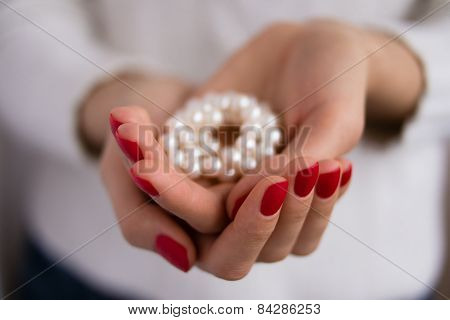 Pearls In Female Hands