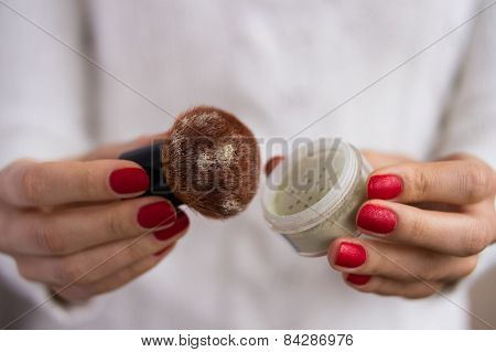 Brush And Powder In Female Hands