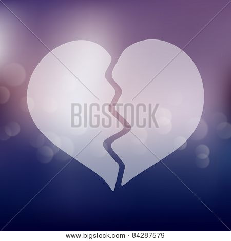 broken heart icon on blurred background
