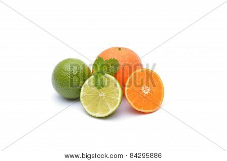 Limes And Tangerines On White Background