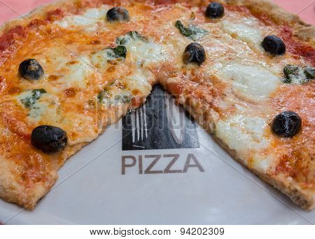 Pizza With Olives And Basil