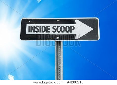 Inside Scoop direction sign with a beautiful day