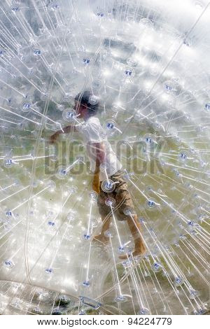 Child Has Fun In The  plastic Ball