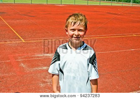 Boy Is Sweating From Soccer Playing But Looking Happy And Self Confident