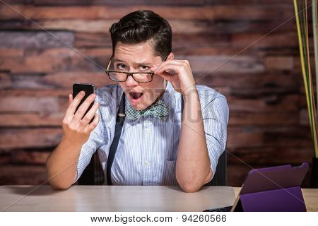 Insulted Boyish Woman Looking At Phone