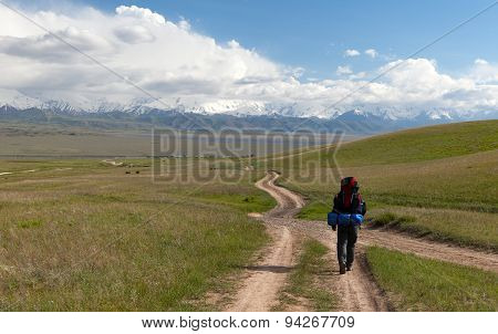 Man On Way In Steppe And Pamir Mountains - Kyrgyzstan