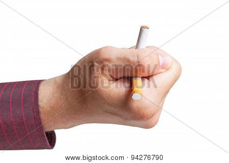 Man breaks a cigarette in his hand