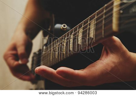 Man playing on guitar