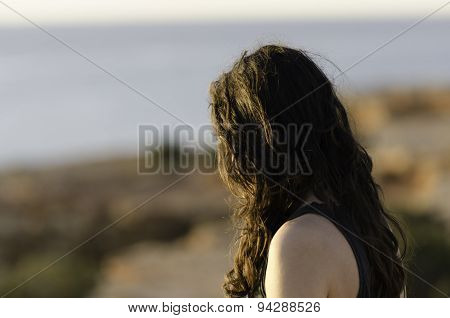Girl Is Looking to The Sea, Ibiza.