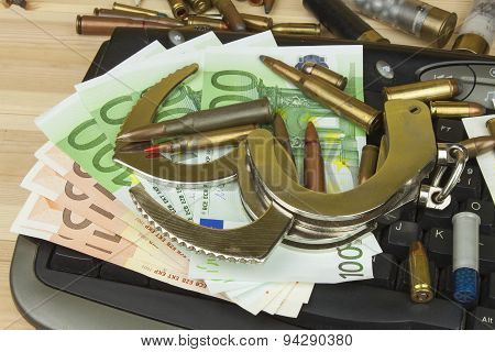 Internet illegal arms trade. Merchant arrest illegal ammunition. Internet crime.