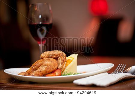 Roasted chicken with potatos, tomotoes and green