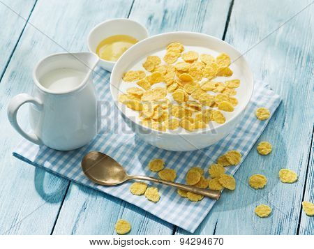 Cornflakes cereal and milk. Morning breakfast.
