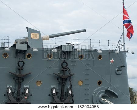 Saint Petersburg Russia September 08 2016: Anchor and bow gun of the cruiser Aurora in St. Petersburg Russia.