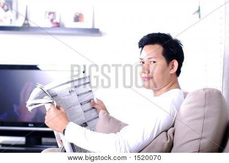 Reading A Newspaper