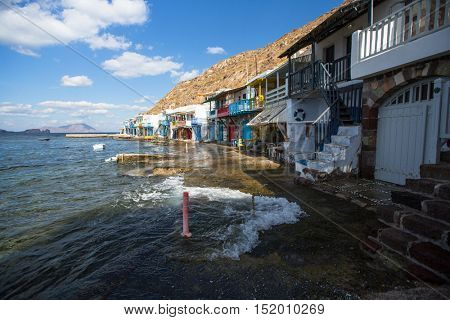 MILOS, GREECE - SEP 25, 2016: Scenic view of traditional fisherman village Klima on the island. Milos - vulcanic island with beautiful beaches, visited by thounds of tourist every year.