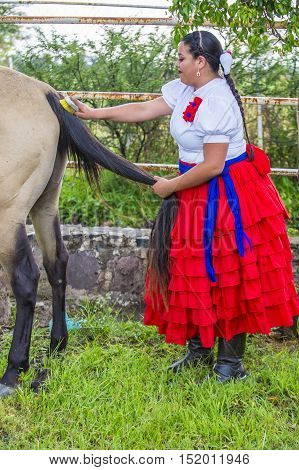 GUADALAJARA MEXICO - SEP 01 : Charra participates at the 23rd International Mariachi & Charros festival in Guadalajara Mexico on September 01 2016.