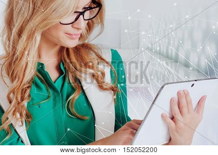 Portrait of young confident business lady, use the tablet, white background