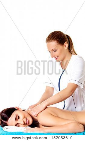 Woman having massage of body in the spa salon. Beauty treatment concept.