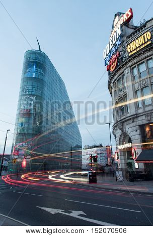Manchester UK - September 23 2016: National Football museum and odean cinema area with car trails near the exchange square