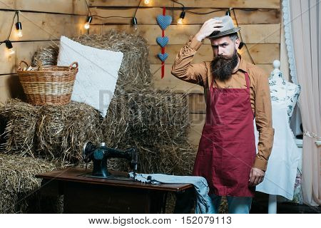 Handsome Tailor Man In Workshop