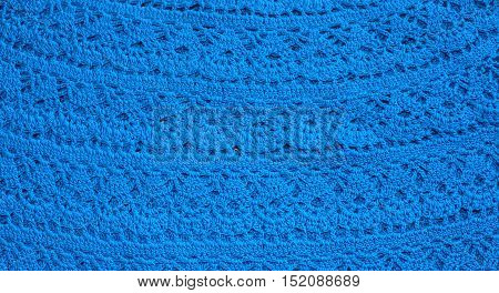 Background image of the blue knitted sweaters.