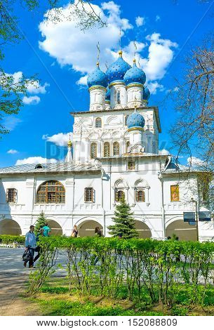 MOSCOW RUSSIA - MAY 10 2015: The Church of Kazan icon of Mother of God in Kolomenskoye Manor hides among the shady trees of garden on May 10 in Moscow.