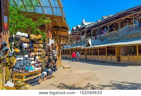 MOSCOW RUSSIA - MAY 10 2015: The fur hats are traditional presents from Russia many stalls of Izmailovsky market offers wide range of this type of accessories on May 10 in Moscow.