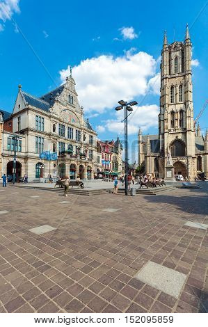 Ghent, Belgium - April 6, 2008:  Tourists Walk On Sint-baafsplein