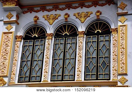 Phuket Thailand - January 8 2012: A beautifully restored Chinese shop house with splendid pargetted designs and decorations on Krabi Road in the Phuket City historic district