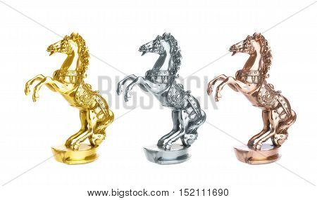 Statuette of horse isolated on white, gold, silver and bronze trophy on horse racing