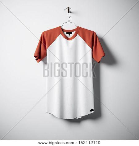 Blank cotton tshirt of white and orange colors hanging in center empty concrete wall. Clear label mockup with highly detailed textured materials. Square. Front side view. 3D rendering