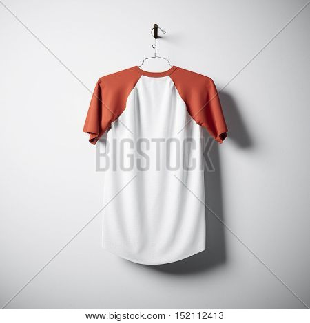 Blank cotton tshirt of white and orange colors hanging in center empty concrete wall. Clear label mockup with highly detailed textured materials. Square. Back side view. 3D rendering