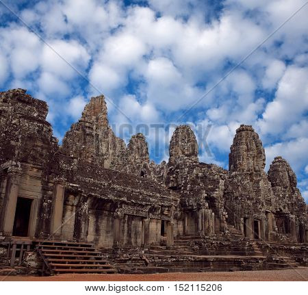 Facade of ancient Prasat Bayon Temple (late 12th - early 13th century) in Angkor Thom Cambodia