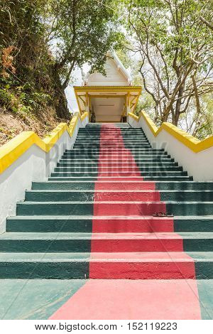 Phuket Thailand - April 25 2016 : The main stair leading to the replica of Phra That In-Kwaen (Hanging Golden Rock) at Sirey temple Phuket Thailand.