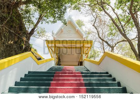 Phuket Thailand - April 25 2016 : The main stair leading to the replica of Phra That In-Kwaen (Hanging Golden Rock) at Sirey temple Phuket Thailand.