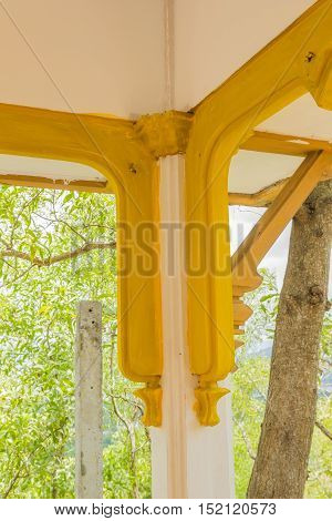 Phuket Thailand - April 25 2016 : Old Burmese or Mon style design decoration at column head at Sirey temple Phuket Thailand.