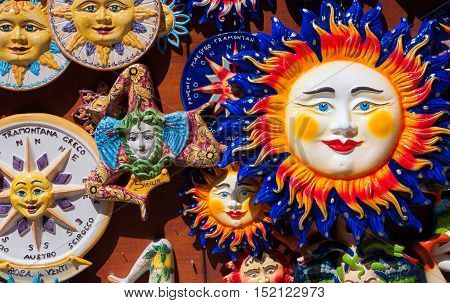 ERICE ITALY - SEPTEMBER 12 2015: Traditional souvenirs of ceramics and Trinacria is symbol of Sicily Italy.