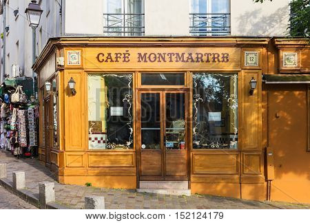Paris France - July 06 2016: The charming Cafe Montmartre on Montmartre hill. Montmartre with traditional french cafes and art galleries is one of the most visited landmarks in Paris.