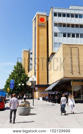 Solna Sweden - June 3 2016: Exterior of the Solna shopping mall with people walking outside.