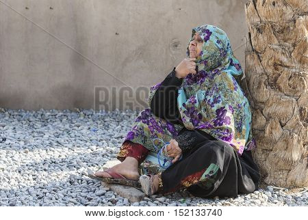 Nizwa Oman October 13th 2016: old omani woman resting