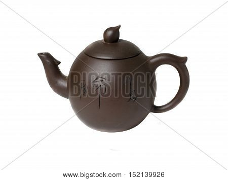 Clay teapot for tea in Chinese style. Brown color