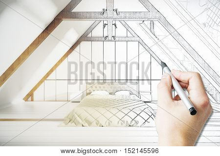 Male hand drawing loft bedroom project with furniture. 3D Rendering