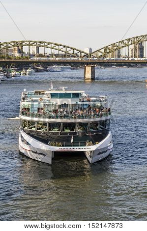 COLOGNE GERMANY - SEP 21 2016: people enjoy the cruise on river Rhine in late afternoon