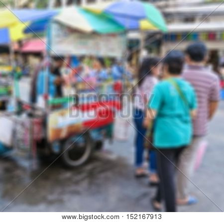 Abstract blur coffee cart stall on street at sampeng market