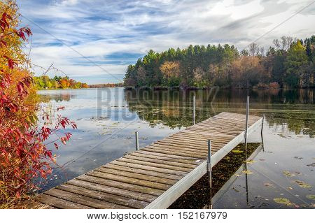 Vibrant autumn colors on the Apple River near Amery Wisconsin USA.