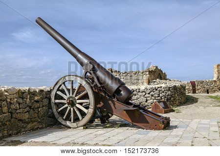 Morella Spain - October 16 2016: An Industrial Artillery Piece at the Morella Castle This canon was Placed in 1954 by the General Captain of Valencia Abriat Miguel Canto.