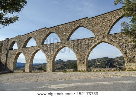 Morella aqueduct in Castellon Maestrazgo at Spain blue sky